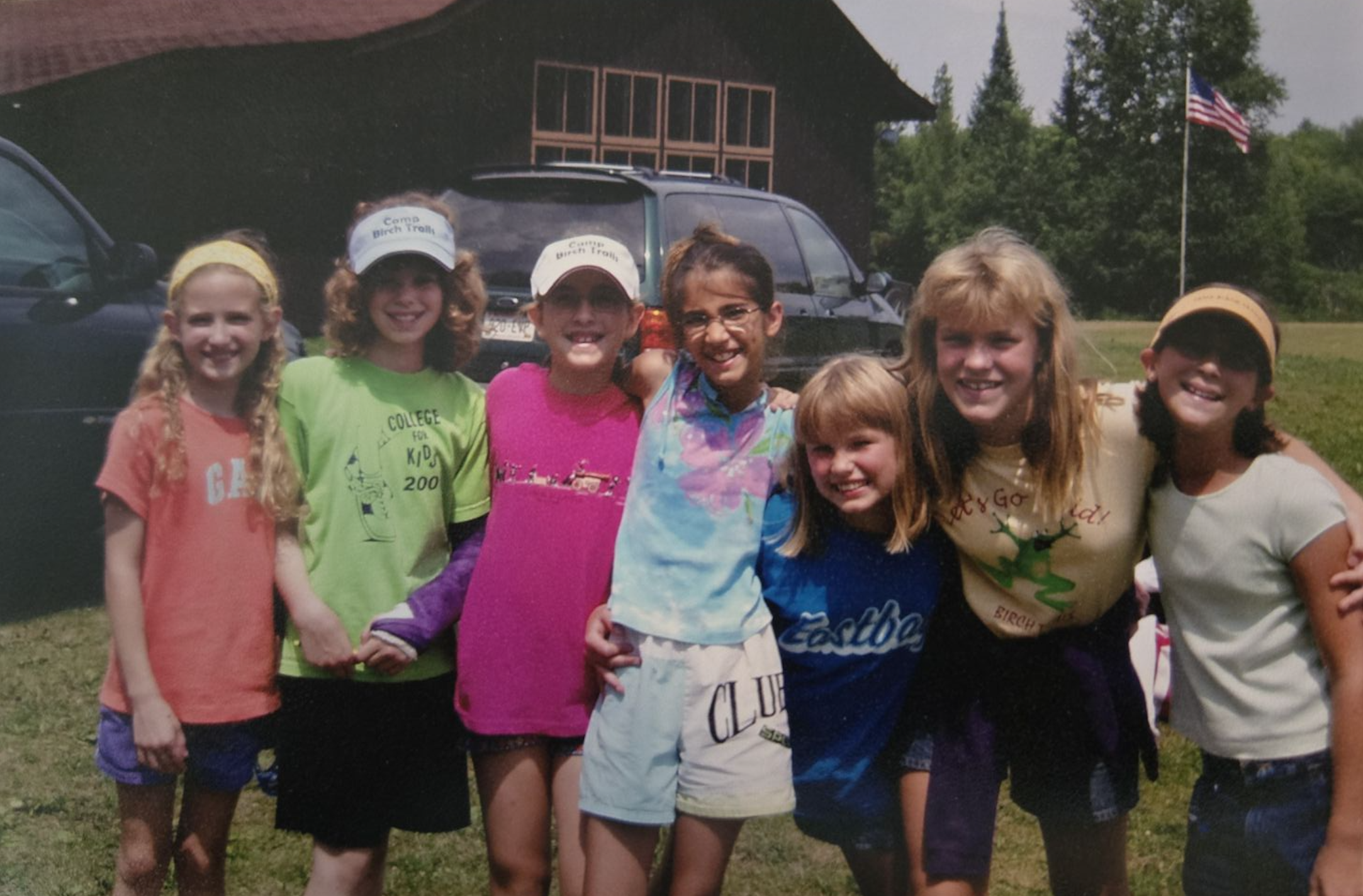 Emily (second from the left) and her Girl Scout troop at Camp Birch Trails in 2002.